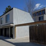 Exterior in corrugated metal cladding at Haus A36 — multiplex with laneway suite in Playter Estates, Toronto by baukultur/ca.