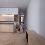 Vaulted kitchen and living area at Haus A36 — multiplex with laneway suite in Playter Estates, Toronto by baukultur/ca.
