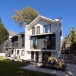 Rear elevation at Haus L1 — multigenerational multiplex renovation in The Beaches, Toronto by baukultur/ca.