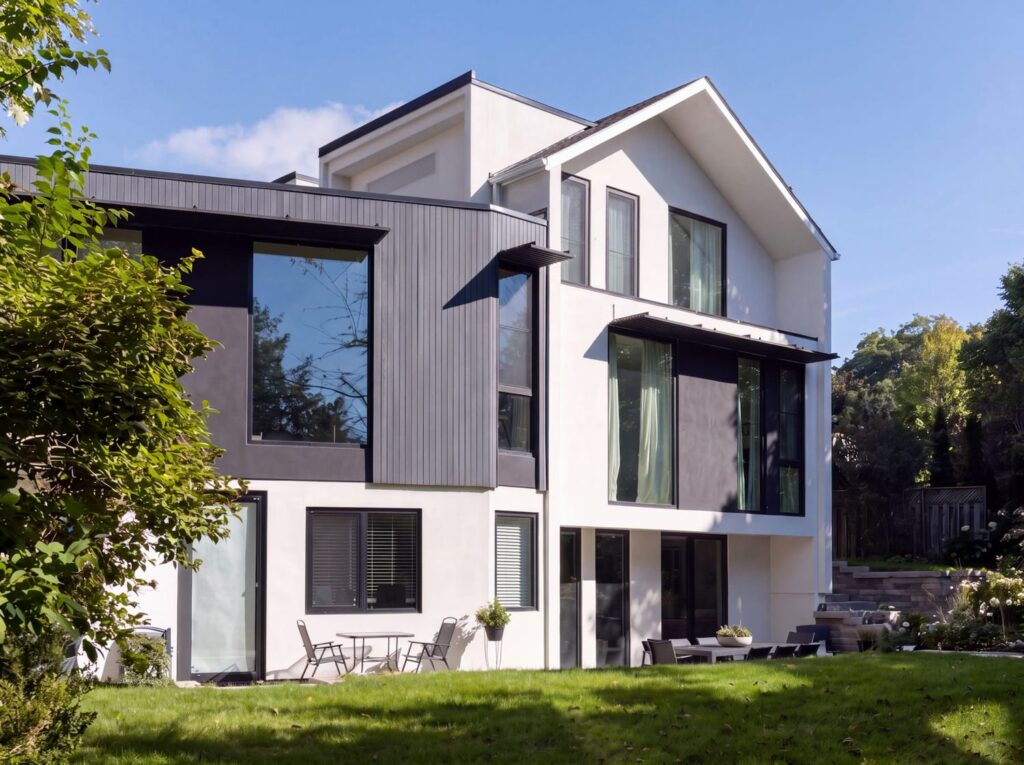 Angled rear elevation at Haus L1 — multigenerational multiplex renovation in The Beaches, Toronto by baukultur/ca.