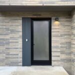 Home A entrance at Haus L1 — multigenerational multiplex renovation in The Beaches, Toronto by baukultur/ca.
