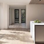 Home A kitchen toward the garden at Haus L1 — multigenerational multiplex renovation in The Beaches, Toronto by baukultur/ca.