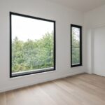 Home A primary bedroom at Haus L1 — multigenerational multiplex renovation in The Beaches, Toronto by baukultur/ca.